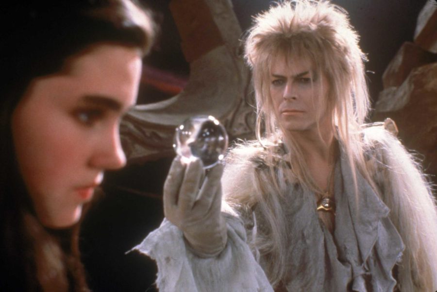 David Bowies Jareth the Goblin King tempts Sarah, the protagonist, with an embodiment of her desires in a scene from the movie Labyrinth. Photo courtesy of Fathom Events.